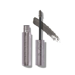 100% PURE Green Tea Fiber Brow Builder tube showing natural fullness for brows