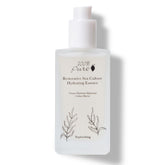 100% PURE Restorative Sea Essence Toner bottle shows hydrating formula for moisturized skin.