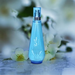 A Center Cool Ocean bottle closeup highlighting airy florals and berries for everyday elegance.