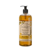 A LA MAISON Honeysuckle bottle closeup showing hydrating lather potential from plant oils.