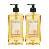 A La Maison Orange Bergamot Body Wash bottle highlights a citrus aroma for a refreshing cleanse.