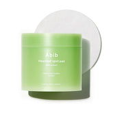 Abib Heartleaf Spot Pad packaging promoting calming skincare for acne-prone skin.