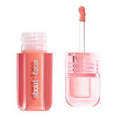about-face Blush Rush bottle with pump for dewy, long-lasting color.