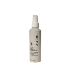 Acure Bonding Leave-In Conditioner spray bottle for smooth, hydrated hair.