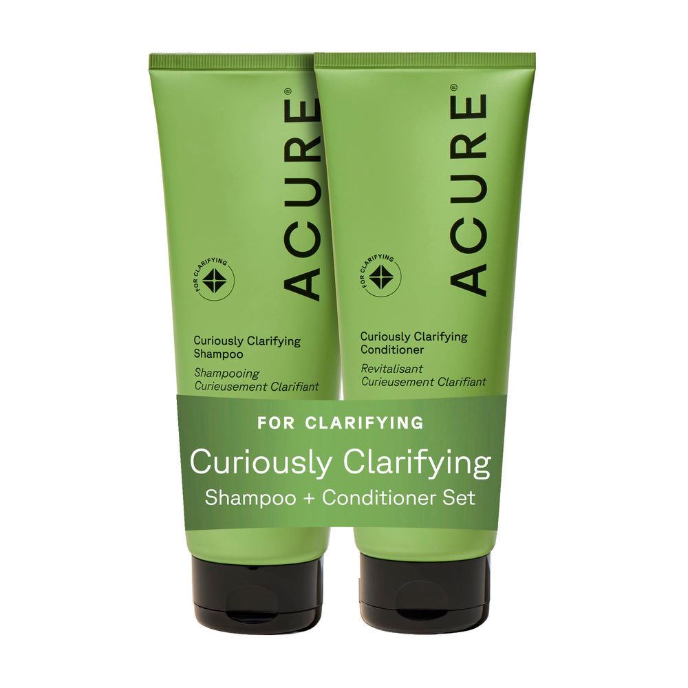 Acure Curiously Clarifying Shampoo bottle shown for detoxifying oily scalp and refreshed hair.