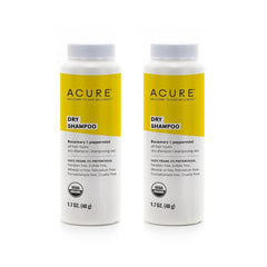 Acure dry shampoo mini bottle cap close-up, highlighting travel-friendly packaging for on-the-go refresh