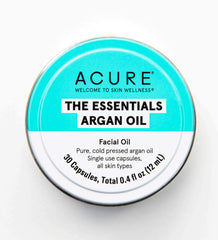 Acure The Essentials Argan Oil Capsules on a reusable tin for travel.