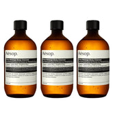 Aesop Citrus Melange Body Cleanser refill bottle being poured for a refreshing citrus cleanse.