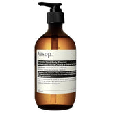 Aesop Coriander Seed Body Cleanser bottle pour shows a warming aroma and clean finish.