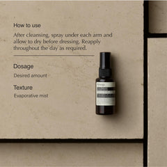 Aesop Herbal Deodorant Spray application underarm for a fresh feel.