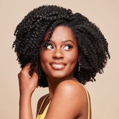 African Pride Moisture Miracle hair application demonstrates smooth coils