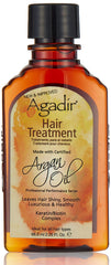 Agadir Argan Oil Hair Treatment bottle close-up shows radiant shine and smoothness.