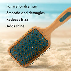 Agave Healing Oil bamboo paddle brush damp hair use demonstrates smoothing.