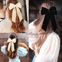 Aileam velvet bow clipped to hair for secure hold