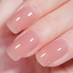 AILLSA Nude Pink Gel Polish bottle shows translucent nude pink shade for versatile nail looks.