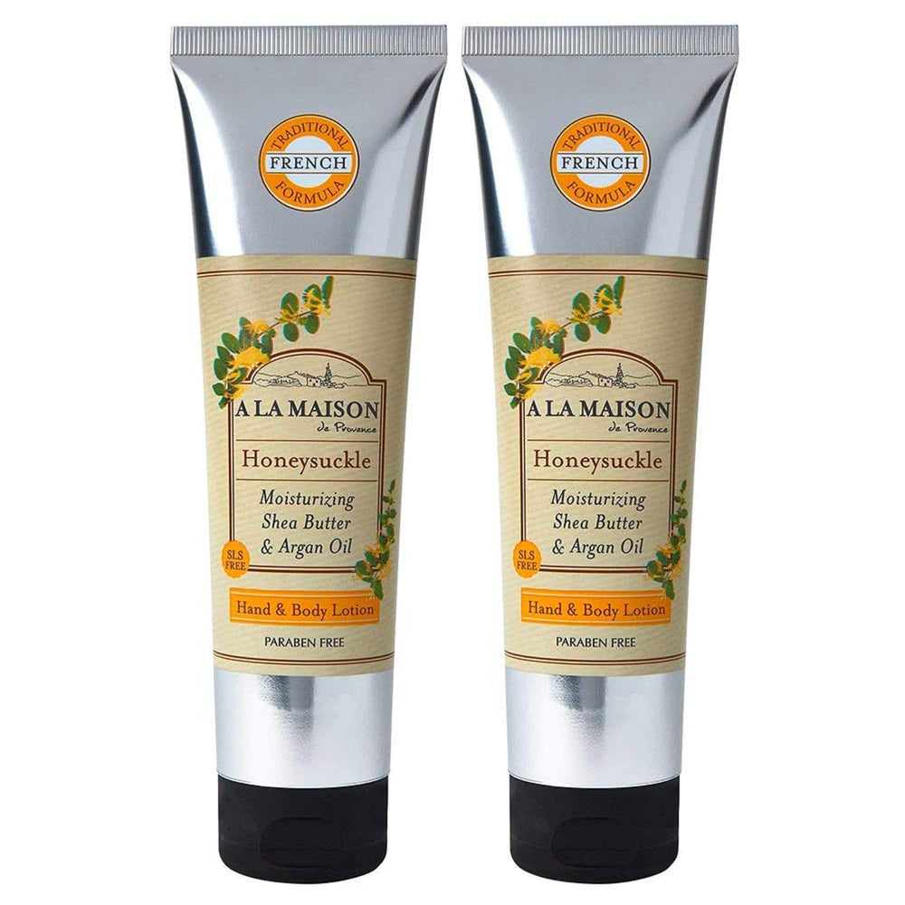 A LA MAISON honeysuckle lotion bottle for daily moisturization.