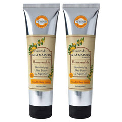 A LA MAISON honeysuckle lotion bottle for daily moisturization.