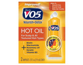 Alberto VO5 Hot Oil Therapy bottle pour for shiny, hydrated hair.