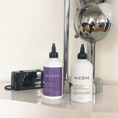 Alcôve Hydrating Conditioner bottle providing slip and manageability without weighing down.