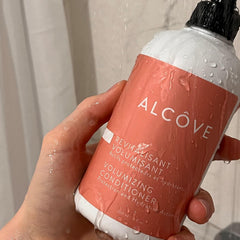 Alcôve Volumizing Conditioner texture on hair looks silky and light