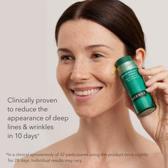 Close-up of the serum dropper revealing time-release retinol formula
