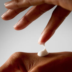 ALO Superfruit pump bottle dispensing lotion into hand