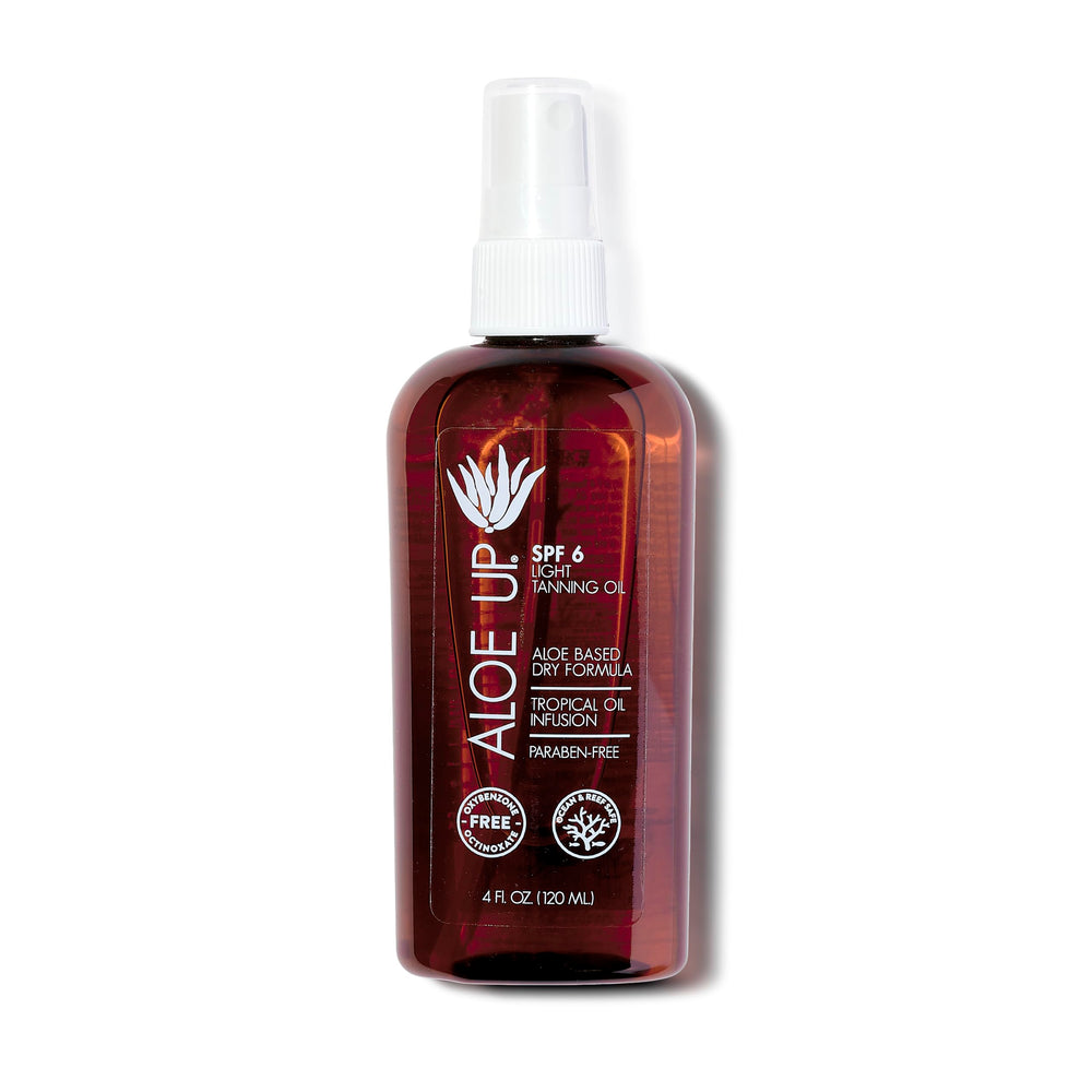 Aloe Up light tanning oil bottle with pump absorbs quickly and leaves a light, non-greasy finish.