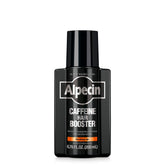 Alpecin Caffeine Hair Booster bottle pour with new fragrance for refreshing scalp routine.