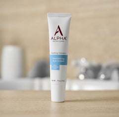 Application of Alpha Skin Care eye cream with hyaluronic acid for smooth, quick absorption around the eyes.