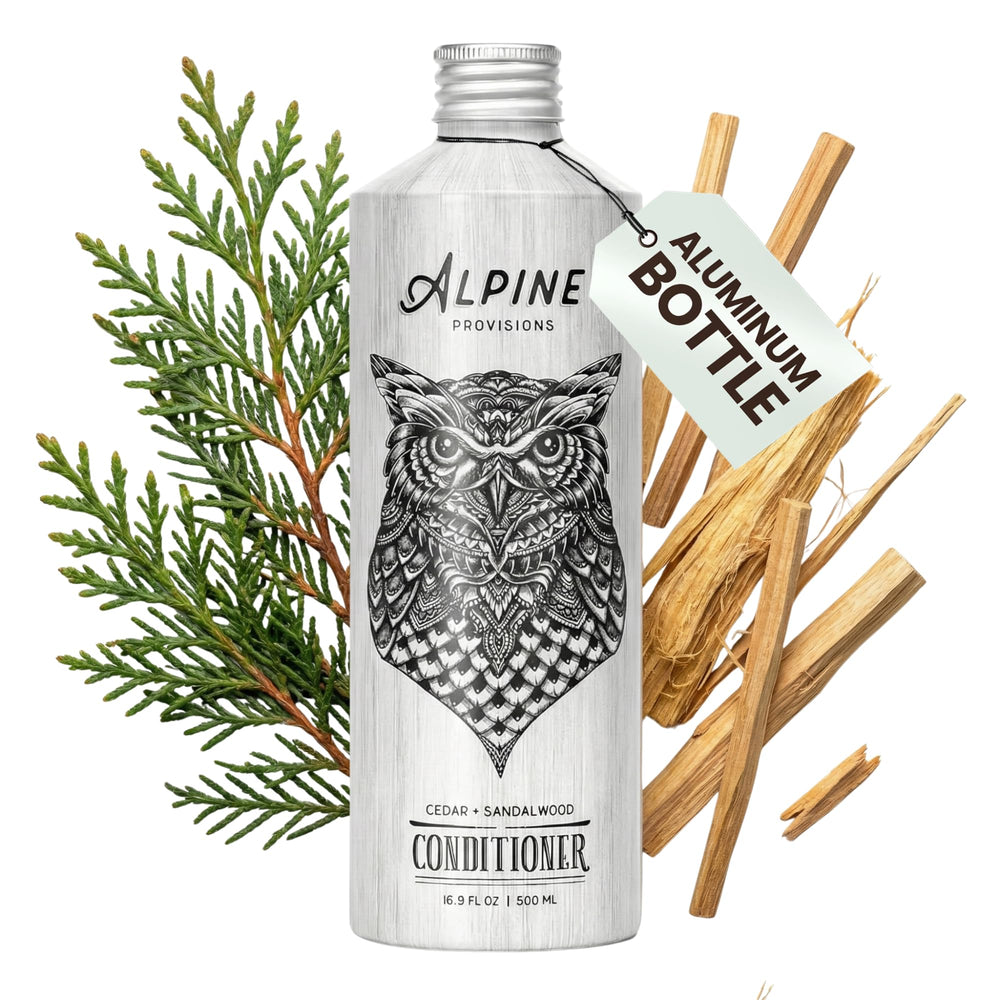 Alpine Provisions cedar-sandalwood conditioner bottle with spa-like scent for daily conditioning.