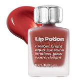 Alternativestereo Lip Potion Aqua Glow No.2 Fig Candy bottle close-up, hydrating gloss.