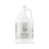 Amenie Lavender Mint Body Wash bottle on a spa shelf, ideal for hotel amenities.