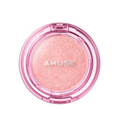 Amuse Seoul Face Diamond Highlighter enhances cheekbones with pink rose-gold glow.