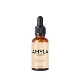 Amyla Hair Growth Serum bottle on a clean surface for nourishment and shine