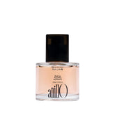 ANILLO Black Tea Nourishing Hair Essence bottle highlights lightweight formula for silky shine
