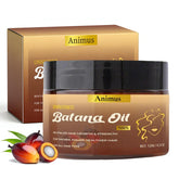 Animus Batana Oil bottle pour shows easy application and hydration.