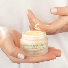 Annemarie Borlind LL Regeneration System Vitality Night Cream being dispensed for nightly hydration.