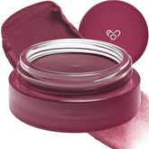 AOU Floofy Matte Balm on lips with muted magenta tint and cushion finish.
