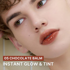 AOU Glowy Tint Balm swatch highlights its melting texture on lips.