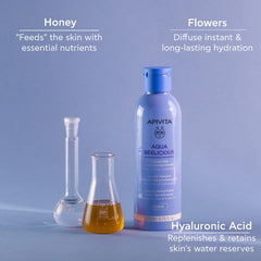 APIVITA Aqua Beelicious toner closeup highlights honey and prebiotic blend.