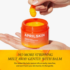 APRILSKIN Cleansing balm in action removing makeup and sunscreen without harsh rubbing.