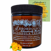 Arbordoun Calendula Cream amber jar front view for tattoo aftercare.