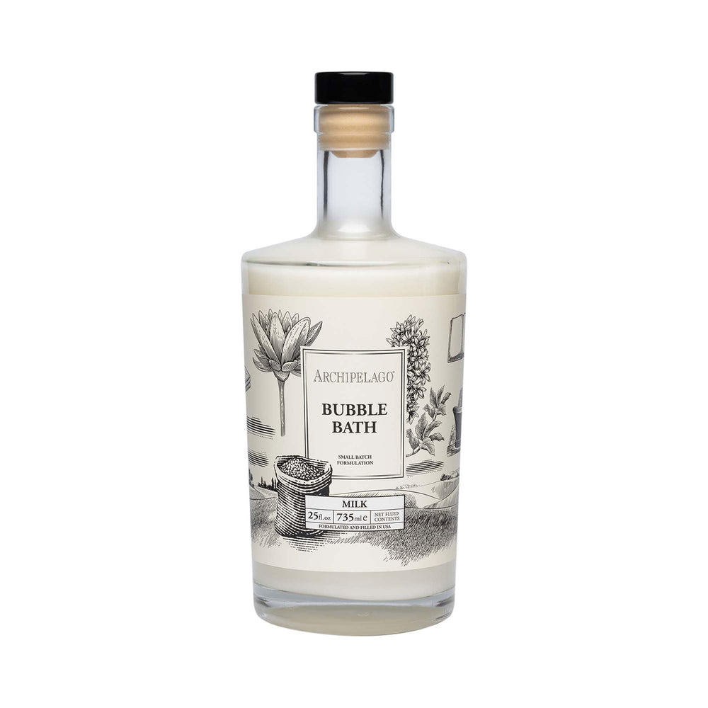 Archipelago Botanicals Luxury Milk Bubble Bath bottle pouring creates rich bubbles for a soothing soak