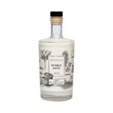 Archipelago Botanicals Luxury Milk Bubble Bath bottle pouring creates rich bubbles for a soothing soak