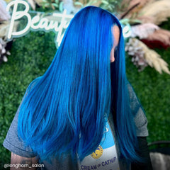 Hair after Poseidon color shows rich blue shine and even coverage.