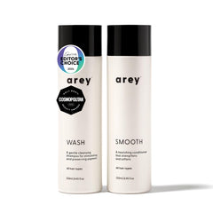 Arey Shower Duo shampoo bottle—daily wash formula helps preserve pigment and scalp health.