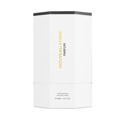 Armaf Flavia Nouveau Ambre spray action captures a moment of allure.