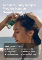 AROMATICA rosemary oil caffeine serum bottle applying to scalp for targeted care.