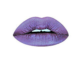 Aromi Violet Plum lip color in tube front highlights bold metallic shine for evening looks.