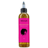 ARSYCHLL Minnah Hair Growth Oil bottle for daily scalp nourishment.